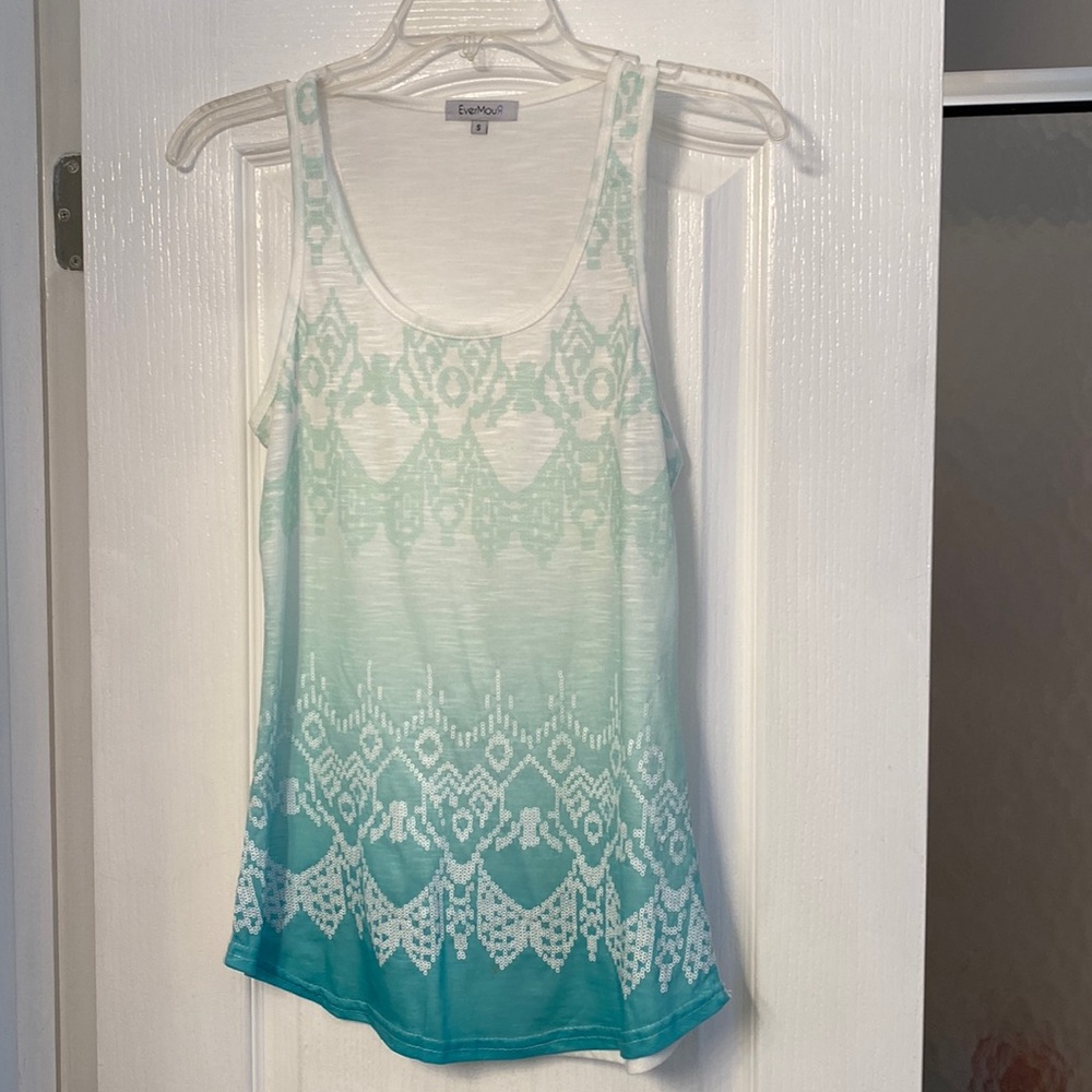White/greenish blue tank